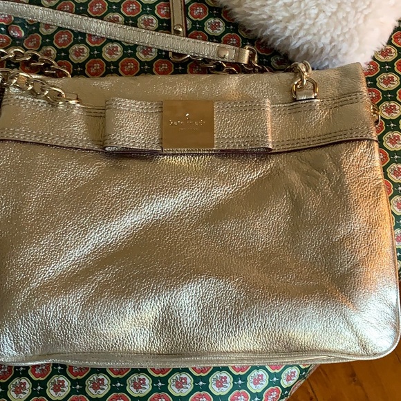 kate spade Handbags - Kate spade gold metallic bow purse. Never used. Retail 298‎